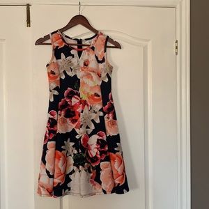 Multicolored sleeveless floral dress for a young girl